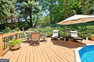 WELCOME HOME TO THIS BEAUTIFUL AND EXPANSIVE HOME FEATURING OVER on Collins Hill Golf Club in Georgia - for sale on GolfHomes.com, golf home, golf lot
