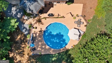 WELCOME HOME TO THIS BEAUTIFUL AND EXPANSIVE HOME FEATURING OVER on Collins Hill Golf Club in Georgia - for sale on GolfHomes.com, golf home, golf lot