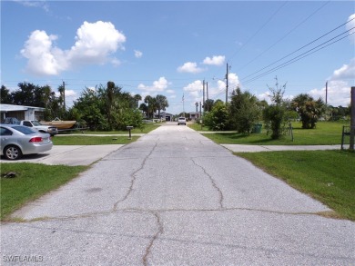 This lot is on a quiet street that would be a great place to on Twin Isles Country Club in Florida - for sale on GolfHomes.com, golf home, golf lot