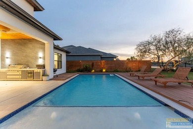 Stunning modern home built in 2022, located in the SPI golf on South Padre Island Golf Club in Texas - for sale on GolfHomes.com, golf home, golf lot