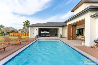 Stunning modern home built in 2022, located in the SPI golf on South Padre Island Golf Club in Texas - for sale on GolfHomes.com, golf home, golf lot