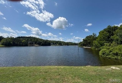 Lake Front Lot on Almost 1/2 Acre Lot on Small Private Lake on Raintree Country Club in Missouri - for sale on GolfHomes.com, golf home, golf lot