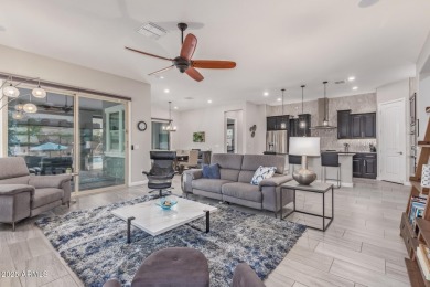 Discover this beautifully upgraded home in the highly on Verrado Golf Club - Victory in Arizona - for sale on GolfHomes.com, golf home, golf lot