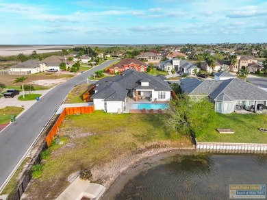 Stunning modern home built in 2022, located in the SPI golf on South Padre Island Golf Club in Texas - for sale on GolfHomes.com, golf home, golf lot