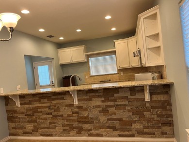 Property Description: This coastal home is conveniently located on Rockport Country Club in Texas - for sale on GolfHomes.com, golf home, golf lot
