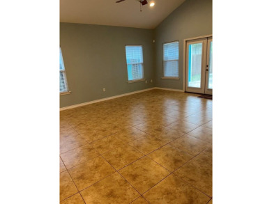Property Description: This coastal home is conveniently located on Rockport Country Club in Texas - for sale on GolfHomes.com, golf home, golf lot