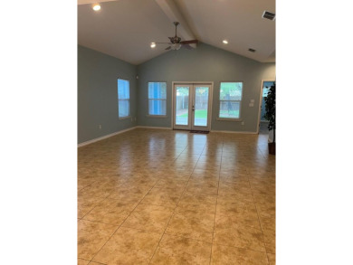 Property Description: This coastal home is conveniently located on Rockport Country Club in Texas - for sale on GolfHomes.com, golf home, golf lot