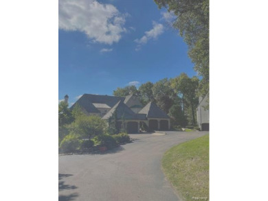 THIS BEAUTIFUL CONDO OVERLOOKING THE 9TH FAIRWAY OF THE EAGLE AT on Pine Knob Golf Club - Hawk in Michigan - for sale on GolfHomes.com, golf home, golf lot