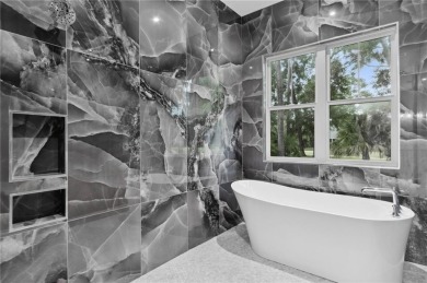Experience refined luxury and exceptional design! Situated on on The King and Prince Golf Course, Home of the Hampton Club in Georgia - for sale on GolfHomes.com, golf home, golf lot