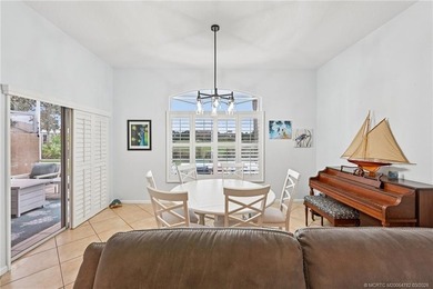 Enjoy stunning golf course and pond views from the expansive on Eagle Marsh Golf Club in Florida - for sale on GolfHomes.com, golf home, golf lot