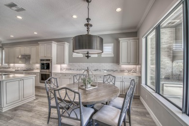 This residence is thoughtfully designed for seamless on Jupiter Country Club in Florida - for sale on GolfHomes.com, golf home, golf lot