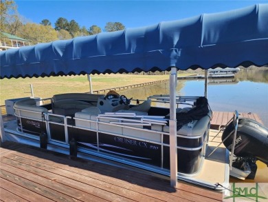 LAKE OCONEE HOME WITH DESIGNATED SLIP, BOAT DOCK  ROOM FOR A on The Golf Club at Cuscowilla in Georgia - for sale on GolfHomes.com, golf home, golf lot
