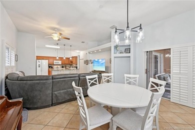 Enjoy stunning golf course and pond views from the expansive on Eagle Marsh Golf Club in Florida - for sale on GolfHomes.com, golf home, golf lot