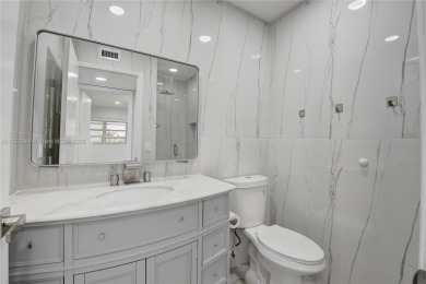 Step into this impeccably remodeled 2 bedroom 2 bathroom condo on Kings Point Golf - Executive in Florida - for sale on GolfHomes.com, golf home, golf lot