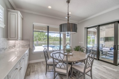 This residence is thoughtfully designed for seamless on Jupiter Country Club in Florida - for sale on GolfHomes.com, golf home, golf lot