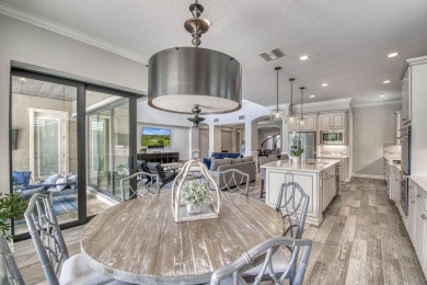 This residence is thoughtfully designed for seamless on Jupiter Country Club in Florida - for sale on GolfHomes.com, golf home, golf lot