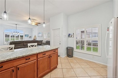 Enjoy stunning golf course and pond views from the expansive on Eagle Marsh Golf Club in Florida - for sale on GolfHomes.com, golf home, golf lot