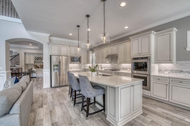 This residence is thoughtfully designed for seamless on Jupiter Country Club in Florida - for sale on GolfHomes.com, golf home, golf lot