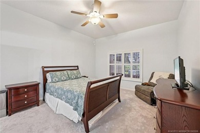 Enjoy stunning golf course and pond views from the expansive on Eagle Marsh Golf Club in Florida - for sale on GolfHomes.com, golf home, golf lot