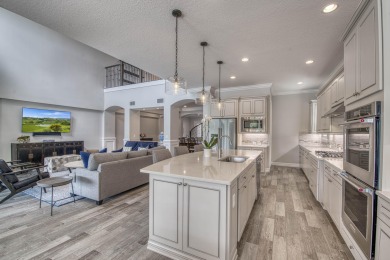 This residence is thoughtfully designed for seamless on Jupiter Country Club in Florida - for sale on GolfHomes.com, golf home, golf lot