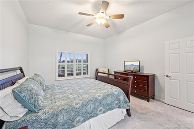 Enjoy stunning golf course and pond views from the expansive on Eagle Marsh Golf Club in Florida - for sale on GolfHomes.com, golf home, golf lot