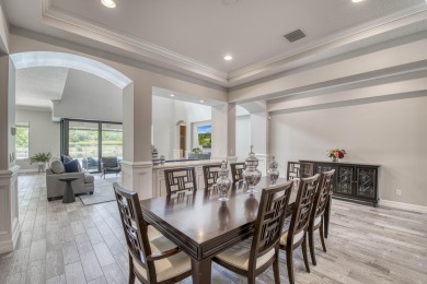 This residence is thoughtfully designed for seamless on Jupiter Country Club in Florida - for sale on GolfHomes.com, golf home, golf lot