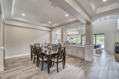 This residence is thoughtfully designed for seamless on Jupiter Country Club in Florida - for sale on GolfHomes.com, golf home, golf lot