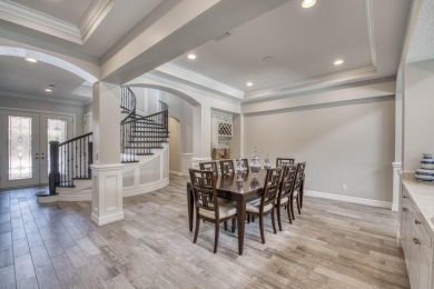This residence is thoughtfully designed for seamless on Jupiter Country Club in Florida - for sale on GolfHomes.com, golf home, golf lot