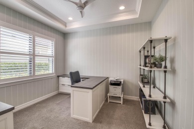 This residence is thoughtfully designed for seamless on Jupiter Country Club in Florida - for sale on GolfHomes.com, golf home, golf lot