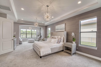 This residence is thoughtfully designed for seamless on Jupiter Country Club in Florida - for sale on GolfHomes.com, golf home, golf lot