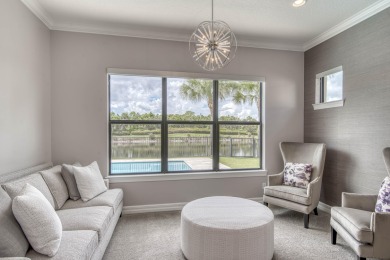This residence is thoughtfully designed for seamless on Jupiter Country Club in Florida - for sale on GolfHomes.com, golf home, golf lot