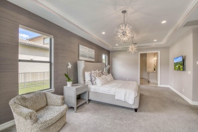 This residence is thoughtfully designed for seamless on Jupiter Country Club in Florida - for sale on GolfHomes.com, golf home, golf lot
