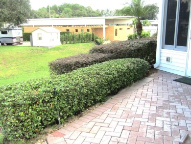 Welcome to 1133 Deer Creek Blvd. in the beautiful 55+ Regal on Deer Creek RV Golf Resort in Florida - for sale on GolfHomes.com, golf home, golf lot