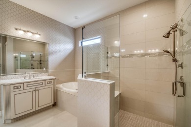 This residence is thoughtfully designed for seamless on Jupiter Country Club in Florida - for sale on GolfHomes.com, golf home, golf lot