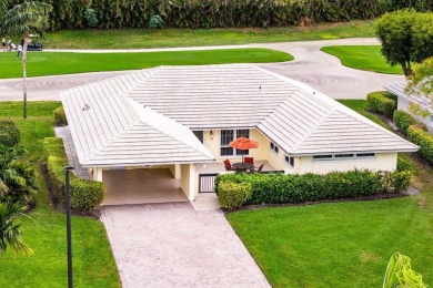 This inviting 3-bedroom, 3 and 1/2 bathroom home  perfect blend on Quail Ridge Golf Course and Country Club in Florida - for sale on GolfHomes.com, golf home, golf lot