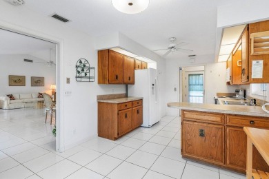 This inviting 3-bedroom, 3 and 1/2 bathroom home  perfect blend on Quail Ridge Golf Course and Country Club in Florida - for sale on GolfHomes.com, golf home, golf lot