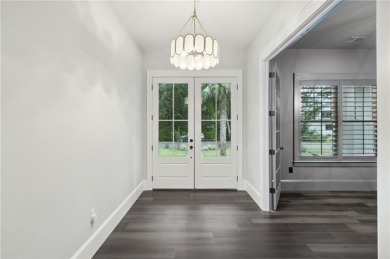 Experience refined luxury and exceptional design! Situated on on The King and Prince Golf Course, Home of the Hampton Club in Georgia - for sale on GolfHomes.com, golf home, golf lot