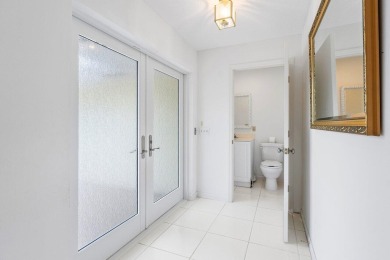 This inviting 3-bedroom, 3 and 1/2 bathroom home  perfect blend on Quail Ridge Golf Course and Country Club in Florida - for sale on GolfHomes.com, golf home, golf lot