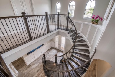 This residence is thoughtfully designed for seamless on Jupiter Country Club in Florida - for sale on GolfHomes.com, golf home, golf lot