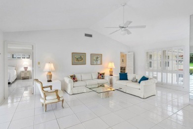 This inviting 3-bedroom, 3 and 1/2 bathroom home  perfect blend on Quail Ridge Golf Course and Country Club in Florida - for sale on GolfHomes.com, golf home, golf lot