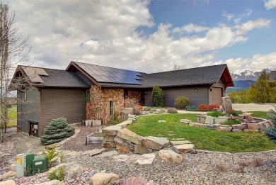 Welcome to this beautiful custom-built home in the Mission Bay on Polson Bay Golf Course - Championship Course in Montana - for sale on GolfHomes.com, golf home, golf lot