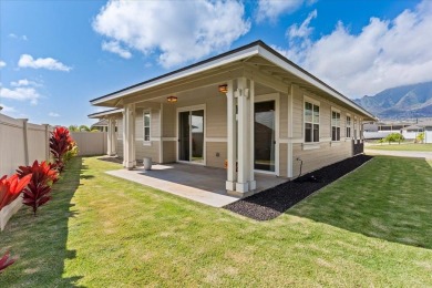 As you step into this like-new 2022 home in the Parkways at Maui on The Dunes At Maui Lani Golf Course in Hawaii - for sale on GolfHomes.com, golf home, golf lot