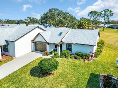 This exceptional villa home features wide golf course views and on Highland Lakes Executive Golf Course in Florida - for sale on GolfHomes.com, golf home, golf lot