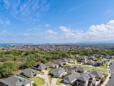 As you step into this like-new 2022 home in the Parkways at Maui on The Dunes At Maui Lani Golf Course in Hawaii - for sale on GolfHomes.com, golf home, golf lot