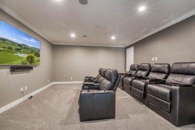 This residence is thoughtfully designed for seamless on Jupiter Country Club in Florida - for sale on GolfHomes.com, golf home, golf lot