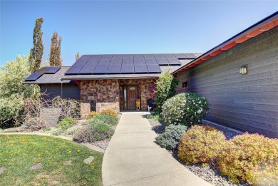 Welcome to this beautiful custom-built home in the Mission Bay on Polson Bay Golf Course - Championship Course in Montana - for sale on GolfHomes.com, golf home, golf lot