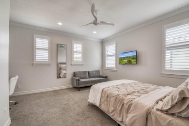 This residence is thoughtfully designed for seamless on Jupiter Country Club in Florida - for sale on GolfHomes.com, golf home, golf lot