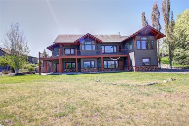 Welcome to this beautiful custom-built home in the Mission Bay on Polson Bay Golf Course - Championship Course in Montana - for sale on GolfHomes.com, golf home, golf lot