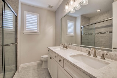 This residence is thoughtfully designed for seamless on Jupiter Country Club in Florida - for sale on GolfHomes.com, golf home, golf lot