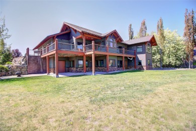 Welcome to this beautiful custom-built home in the Mission Bay on Polson Bay Golf Course - Championship Course in Montana - for sale on GolfHomes.com, golf home, golf lot